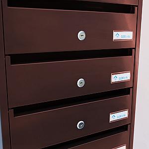 PD937 Vertical indoor postbox, 7 mailboxes, brown
